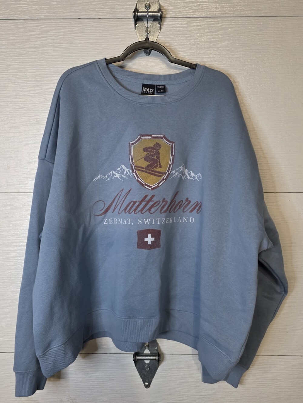 MAD Engine Light Blue Matterhorn Graphic Crewneck Sweatshirt with Gold Crest